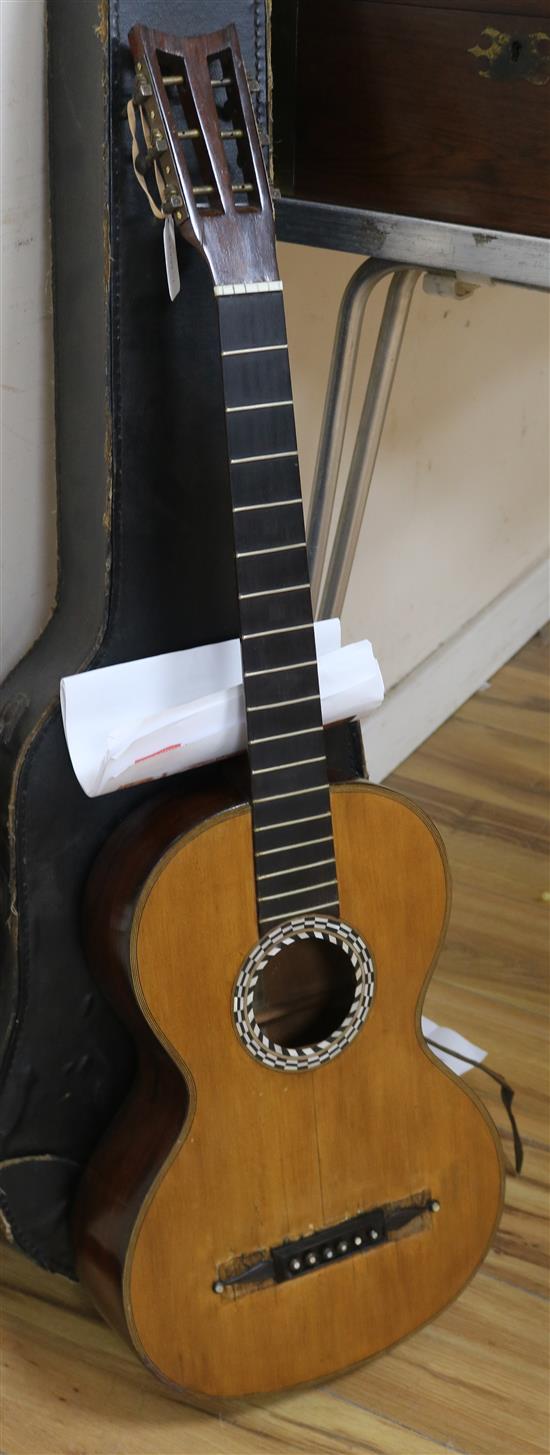 A 19th century Panormo style spruce and rosewood guitar, signed Guiot